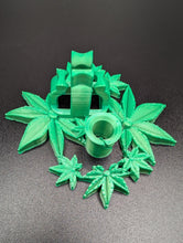 Load image into Gallery viewer, VapeNprop Leafy Buds vape stand holder with green cannabis plant leaf design
Leafy Buds vape pen holder accessory by VapeNprop
Leaf pattern vape cartridge holder keeps devices upright
